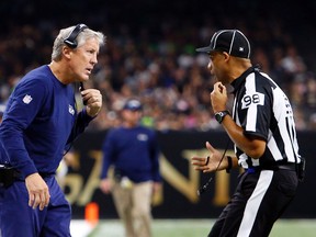 Seattle Seahawks coach Pete Carroll talks to an official during a game against the New Orleans Saints in New Orleans, Sunday, Oct. 30, 2016. (AP Photo/Butch Dill)