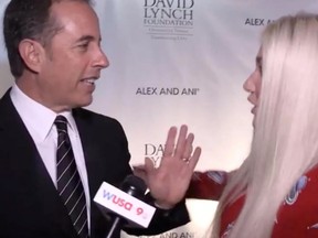 Jerry Seinfeld is pictured saying no to a hug from Kesha at the National Night of Laughter and Song event at the Kennedy Center in Washington, D.C.
