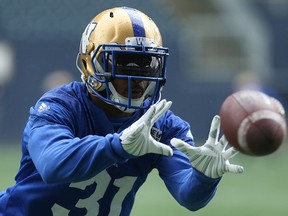 Defensive back Maurice Leggett pulls in a pass during Winnipeg Blue Bomber practice in Winnipeg on Wed., Aug. 9, 2017. Kevin King/Winnipeg Sun/Postmedia Network