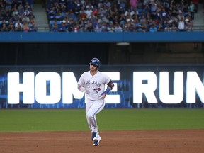 Josh Donaldson of the Toronto Blue Jays circles the bases after hitting a two-run home run during MLB action against the New York Yankees at Rogers Centre on Aug. 8, 2017. (Tom Szczerbowski/Getty Images)