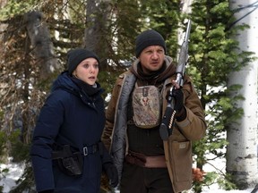 This image released by The Weinstein Company shows Elizabeth Olsen, left, and Jeremy Renner in a scene from "Wind River." (Fred Hayes/The Weinstein Company via AP)