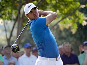 Brooks Koepka watches his tee shot on the 11th hole during the first round of the PGA Championship at the Quail Hollow Club Thursday, Aug. 10, 2017, in Charlotte, N.C. (AP Photo/Chris O’Meara)