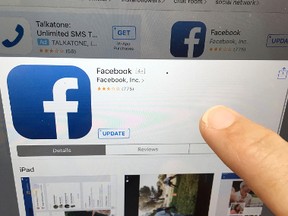 This Monday, June 19, 2017, file photo shows the Facebook app for the iPad, in North Andover, Mass. Facebook is launching a new section dedicated to live and recorded video. The idea is to have fans commenting and interacting with the videos. The new Watch section is a potential threat to Twitter, YouTube, Netflix and other services for watching video. It is available to some U.S. users Thursday, Aug. 10, 2017, and more people will get it over time. (AP Photo/Elise Amendola)