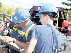 Teenagers considering a career in construction should take advanatage of high school co-op programs to get a feel for the job. (Postmedia News file Photo)