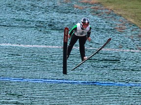 Taylor Henrich lands her jump in Ski Jumping at the the Aviva Invitational Canadian Nationals at Canada Olympic Park on Sept. 26, 2015.( Lorraine Hjalte/Postmedia)