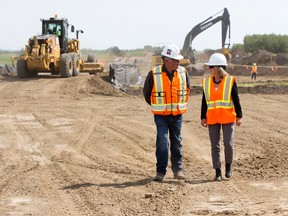 Premier Rachel Notley tours Enbridge’s Line 3 pipeline replacement project with OJ Pipelines Superintendent David Murch, near Hardisty Thursday Aug. 10, 2017. Photo by David Bloom