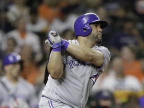 Kendrys Morales of the Toronto Blue Jays hits a two-run home run in the fourth inning against the Houston Astros at Minute Maid Park on Aug. 4, 2017. (Bob Levey/Getty Images)