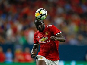 This file photo taken on July 21, 2017 shows Manchester United forward Romelu Lukaku hits a header during the International Champions Cup soccer match against Manchester City at NRG Stadium in Houston, Texas. (AFP Photo)