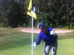 Brit Standen celebrates after shooting a hole-in-one at the Edmonton Country Club. (SUPPLIED)
