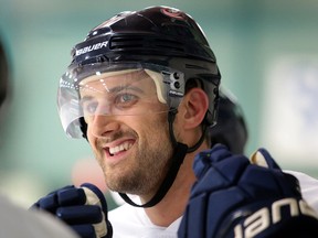 Nick Foligno smiles on the bench at the NHL vs Docs hockey game in support of the NEO Kids  Foundation in Sudbury, Ont. on Thursday August 10, 2017. Gino Donato/Sudbury Star/Postmedia Network