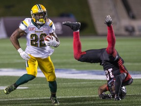 LaDarius Perkins avoids a tackle by Ottawa's Serderius Bryant in the fourth quarter as the Redblacks take on the Eskimos in CFL action at TD Place on Aug. 10, 2017. (Wayne Cuddington/Postmedia)