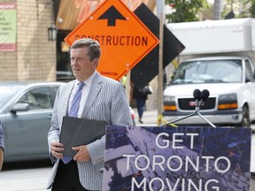 Toronto Mayor John Tory at Dundas and Victoria Sts. to announce the construction project there will finish Aug. 19, more than two months ahead of schedule, part of a new policy to speed up public works, on Thursday August 10, 2017. (Michael Peake/Toronto Sun)