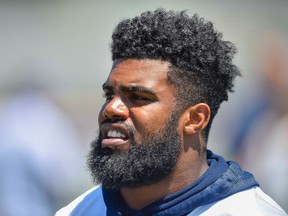 This is a July 25, 2017, file photo showing Dallas Cowboys running back Ezekiel Elliott during NFL football training camp in Oxnard, Calif. Elliott has been suspended for six games under the NFL’s personal conduct policy following the league’s yearlong investigation into the running back’s domestic violence case out of Ohio. (AP Photo/Gus Ruelas)