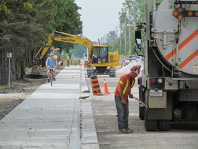 This file photo shows road construction in Sarnia during the summer of 2015. Municipalities in Sarnia-Lambton recently received an installment of this year's allocation of federal gasoline tax funding they each receive annually to help with road and other infrastructure improvements. (File photo/Sarnia Observer/Postmedia Network)