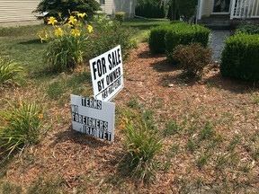 This photo taken Aug. 2, 2017, shows the "No Foreigners" sign in front of James Prater's home in Mason, Mich. (Judy Putnam /Lansing State Journal via AP)