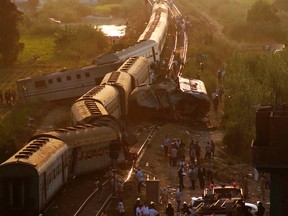 Two trains are seen after they collided just outside Egypt’s Mediterranean port city of Alexandria, Friday, Aug. 11, 2017, killing at least dozens of people and injuring over 100 in the country’s deadliest rail accident in more than a decade. (AP Photo/Ravy Shaker)