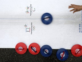 People visit PyeongChang Olympic booth during the ceremony marking the 200 days to go to the PyeongChang Winter Olympic Games on July 22, 2017 in Chuncheon, South Korea. (Woohae Cho/Getty Images)