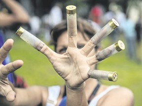 An anti-government activist shows bullet cases during a protest in Valencia, Venezuela, on Sunday, a day after a new assembly with supreme powers and loyal to President Nicolas Maduro started functioning in the country. (RONALDO SCHEMIDT/AFP/Getty Images)