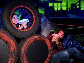 Kodie and Ben Desjardins demonstrate laser tag at Kupp Centre Laser Tag in Sudbury, Ont. on Friday August 11, 2017. The business is holding the grand opening today.Gino Donato/Sudbury Star/Postmedia Network
