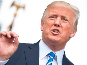 U.S. President Donald Trump speaks to the press on Aug. 11, 2017, at Trump National Golf Club in Bedminster, N.J. (JIM WATSON/AFP/Getty Images)