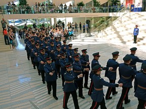 Graduates march at the Edmonton Police Service graduation ceremony for recruit training class #138 at Edmonton City Hall on Friday August 11, 2017. (PHOTO BY LARRY WONG/POSTMEDIA)