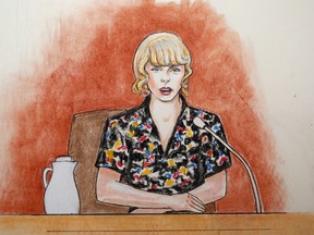 In this courtroom sketch, pop singer Taylor Swift speaks from the witness stand during a trial Thursday, Aug. 10, 2017, in Denver.  (Jeff Kandyba via AP)