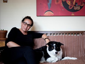 Maryanne Zehil and her dog Zara are seen at Zehil's home in Montreal on Friday. Zara was locked in a cargo bin of an Air Transat plane for six hours as the plane sat on an Ottawa tarmac recently.