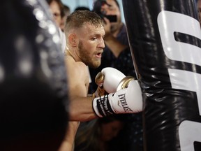 Conor McGregor trains during a media workout Friday, Aug. 11, 2017, in Las Vegas. McGregor is scheduled to fight Floyd Mayweather Jr. in a boxing match Aug. 26 in Las Vegas. (AP Photo/John Locher)