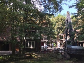 Investigators remain on the scene this weekend of a Lambeth mansion that was struck by fire. Flames gutted the house in 13 minutes Thursday night, doing $1.2 million damage.