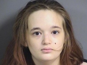 This May 2016 booking photo provided by Johnson County Sheriff's Office shows Ashley Hautzenrader. Court records say Ashley Hautzenrader, 24, accused of trying to flush her newborn down a toilet and then leaving it for dead in a trash can intends to change her plea. The records say a plea hearing is scheduled Aug. 11, 2017 in a Johnson County courtroom in Iowa City for Hautzenrader. She's already pleaded not guilty to attempted murder and child endangerment. The records don't say how she'll plead and to what charges. ( Johnson County Sheriff's Office via AP)