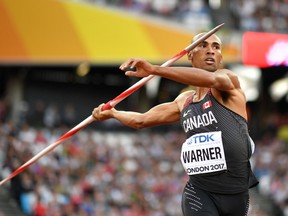 Canada's Damian Warner competes in the men's decathlon javelin throw athletics event at the 2017 IAAF World Championships at the London Stadium in London on August 12, 2017. (Andrej Isakovic/AFP/Getty Images)