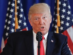 President Donald Trump speaks regarding the on going situation in Charlottesville, Va., Saturday, Aug. 12, 2017 at Trump National Golf Club in Bedminster, N.J. (AP Photo/Pablo Martinez Monsivais)