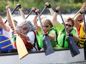 Marjorie Klie (far left) paddles hard along with the rest of the Wellington Legion Dragon Boat Team in the first race of the day at the Wellington Dragon Boat Festival on Saturday August 12, 2017 in Wellington, Ont. Tim Miller/Belleville Intelligencer/Postmedia Network