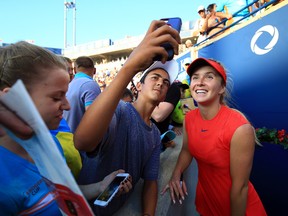 Elina Svitolina of Ukraine meets fans following her semifinal victory over Simona Halep of Romania on Day 8 of the Rogers Cup at Aviva Centre on August 12, 2017 in Toronto, Canada. (Vaughn Ridley/Getty Images)
