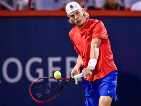Denis Shapovalov of Canada hits a return against Alexander Zverev of Germany during day nine of the Rogers Cup presented by National Bank at Uniprix Stadium on August 12, 2017 in Montreal, Quebec, Canada. (Minas Panagiotakis/Getty Images)