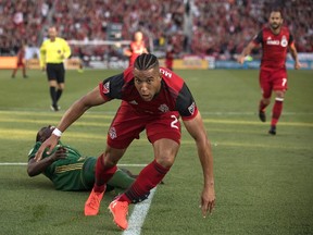 Justin Morrow celebrates his opening goal yesterday. More would follow, including a second from the TFC defender in the rout. The Canadian Press