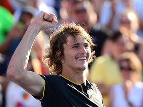Alexander Zverev of Germany celebrates his win over Roger Federer of Switzerland in the final of the Rogers Cup tennis tournament, Sunday, August 13, 2017 in Montreal. (THE CANADIAN PRESS/Paul Chiasson)