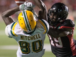 Redblacks defensive back Imoan Claiborne interferes with Eskimos receiver Bryant Mitchell, earning a penalty in the fourth quarter of last Thursday's CFL game at TD Place stadium. Claiborne wrote an Instagram post on Sunday saying he had been released.