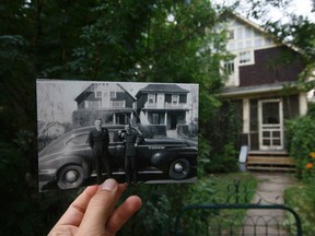 EDMONTON ALBERTA: August 13, 2017 A photograph of Ben Clarke, right, and a friend, in front of the home that used to belong to Ben's dad former mayor Joe Clarke in Edmonton August 13, 2017. Neighbours are upset at a proposal to subdivide the property at 7852 Jasper Ave NW. AMBER BRACKEN/POSTMEDIA