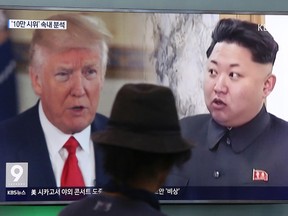 In this Aug. 10, 2017, file photo, a man watches a television screen showing U.S. President Donald Trump, left, and North Korean leader Kim Jong Un during a news program at the Seoul Train Station in Seoul, South Korea. When North Korea makes a threat, the government in Seoul vents its anger while South Korean citizens mostly shrug off what can seem like a daily barrage of hostility. Trump has introduced a new wrinkle to this familiar pattern. His recent Pyongyang-style threat to unleash “fire and fury” on the North has been met with silence from the top levels of government in Seoul - and worry, sometimes anger, from the country’s citizens.