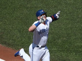 Josh Donaldson of the Blue Jays reacts after hitting a two-run home run in the first inning against the Pirates on Aug. 13, 2017. (TOM SZCZERBOWSKI/Getty Images)