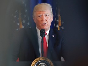 President Donald Trump speaks regarding the ongoing situation in Charlottesville, Va., Saturday, Aug. 12, 2017 at Trump National Golf Club in Bedminster, N.J. (AP Photo/Pablo Martinez Monsivais)