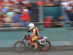 Leamington's Brodie Buchan roars past a packed grandstand at the Fairgrounds during the 2017 George Pepper Classic dirt track motorcycle races Saturday in Belleville. (Don Empey photo)