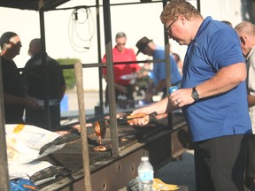 The back parking lot of the Seaforth Legion was filled with hungry locals cooking steak and drinking beers last Thursday. (Shaun Gregory/Huron Expositor)