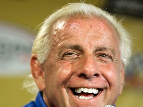In this Sept. 22, 2007, file photo, wrestler Ric Flair addresses the media during a news conference at Dover International Speedway in Dover, Del. Flair's representative said on Twitter Aug. 14, 2017, that Flair was dealing with some "tough medical issues." (AP Photo/Carolyn Kaster, File)