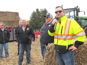 Dave Park, president of the Cellulosic Sugar Producers Co-operative, is shown in this file photo speaking at a demonstration in November of corn stalk and leaves collection and bailing on a farm near Forest. The co-op has hired a full-time general manager and continues to seek new members and investors for a joint venture with Comet Biorefining.
(Paul Morden/Sarnia Observer)