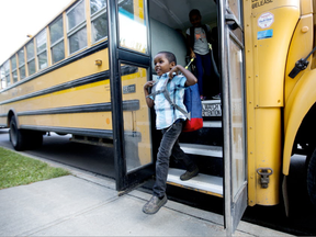 Students arrive for the first day of school at St. Teresa of Calcutta School, 9008 105A Ave., in Edmonton Monday Aug. 14, 2017. Approximately 330 students were expected to return to the year-round school Monday morning David Bloom/Postmedia