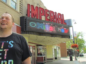 Ian Alexander, creator and director of the OMiGodshow running Friday and Saturday at the Imperial Theatre, stands in front of the marquee in downtown Sarnia. The sketch comedy show was written and staged by a group of local residents. (Paul Morden/Sarnia Observer/Postmedia Network)
