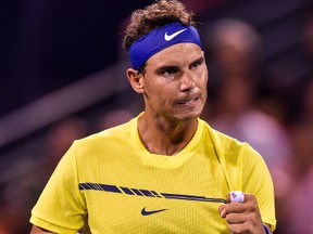 Rafael Nadal of Spain reacts after scoring a point against Denis Shapovalov of Canada during day seven of the Rogers Cup presented by National Bank at Uniprix Stadium on August 10, 2017 in Montreal, Quebec, Canada. (Minas Panagiotakis/Getty Images)
