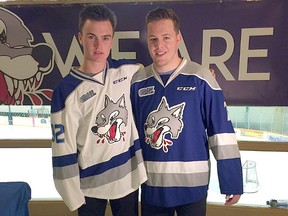 Sudbury Wolves Blake Murray, left, and Reagan O'Grady model the team's new jerseys at Gerry McCrory Countryside Sports Complex in Sudbury on Monday, Aug. 14, 2017. Gino Donato/The Sudbury Star/Postmedia Network